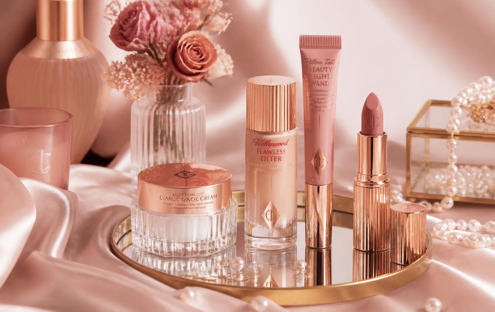 Productos de belleza de Dos Musas Boutique sobre seda rosa